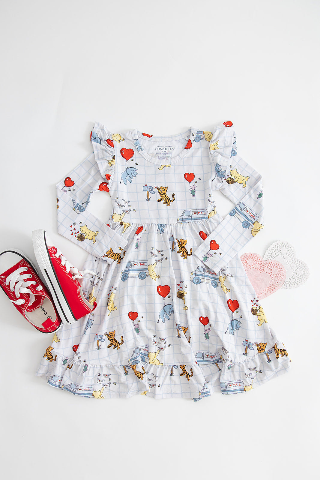 Vintage Winnie the Pooh bamboo twirl dress with Tigger, Eeyore and Piglet in a Valentine's Day print for baby and toddler boys and girls.