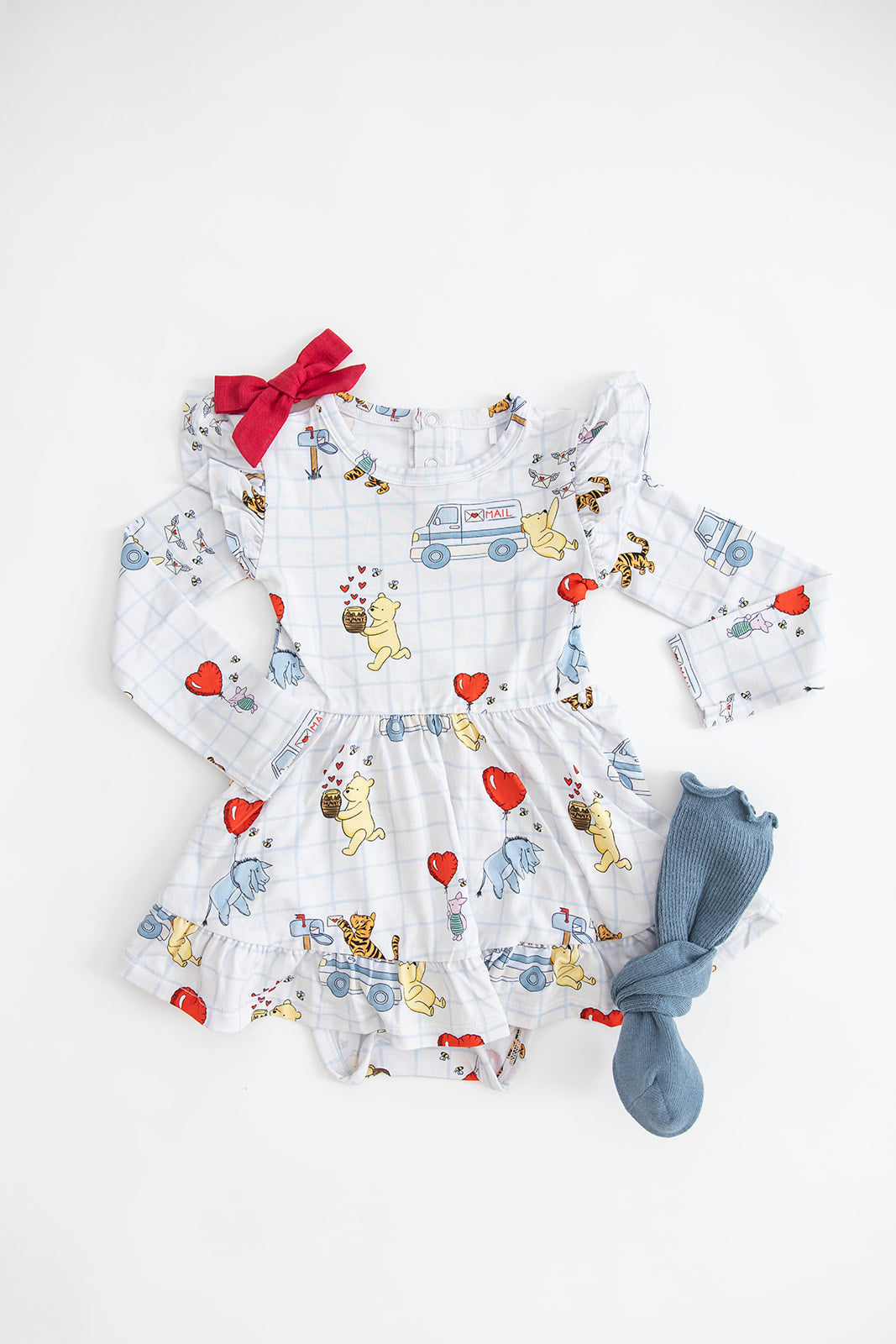 Vintage Winnie the Pooh bamboo twirl dress with Tigger, Eeyore and Piglet in a Valentine's Day print for baby and toddler boys and girls.
