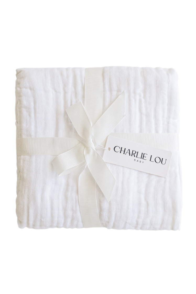 White 100% cotton muslin quilt, blanket or towel for baby girls, baby boys or toddlers.