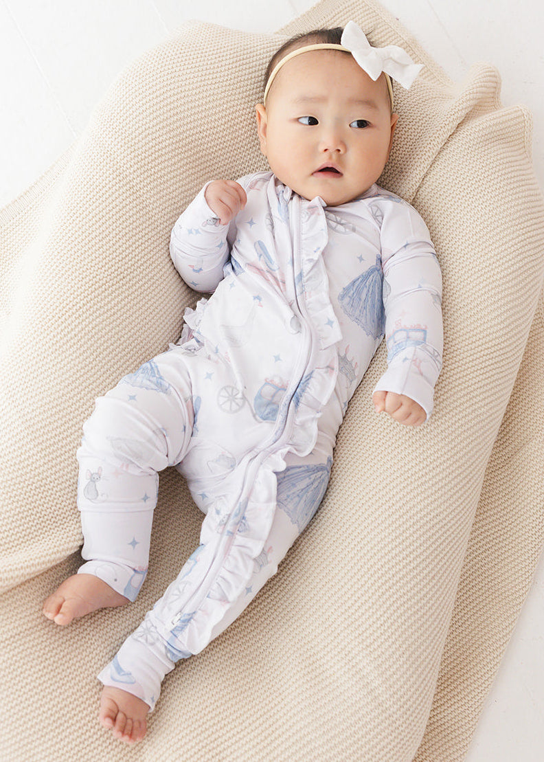 Bamboo convertible double zipper romper with hand and foot cuffs. Zippy has a vintage Disney Cinderella print on it.