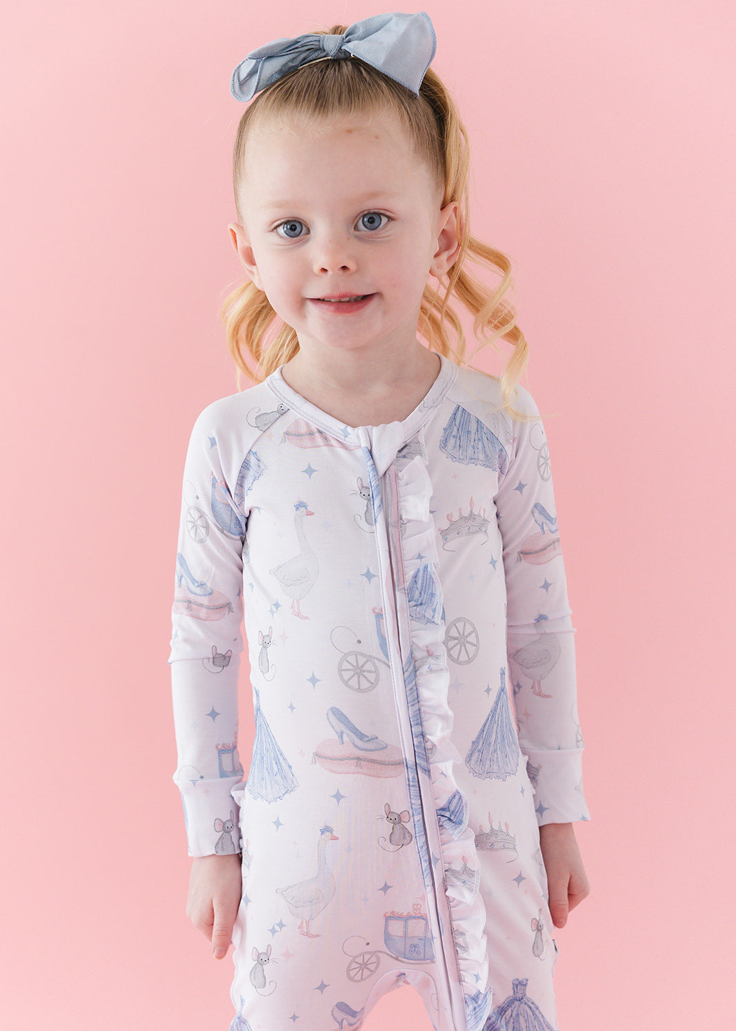 Bamboo convertible double zipper romper with hand and foot cuffs. Zippy has a vintage Disney Cinderella print on it.