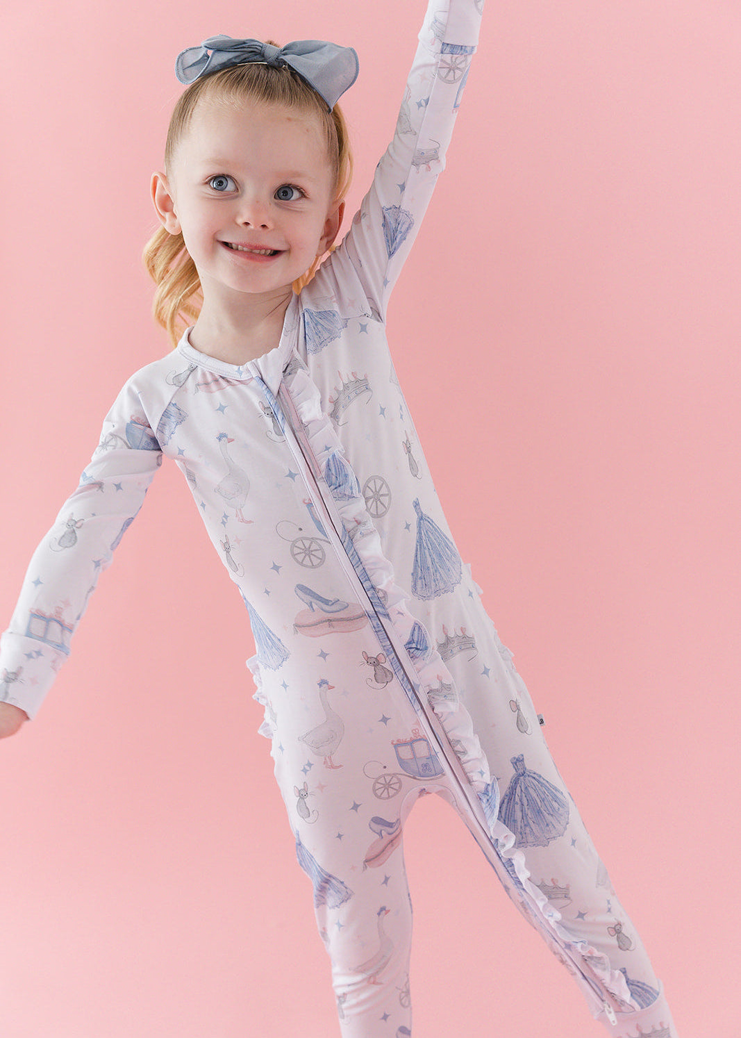 Bamboo convertible double zipper romper with hand and foot cuffs. Zippy has a vintage Disney Cinderella print on it.