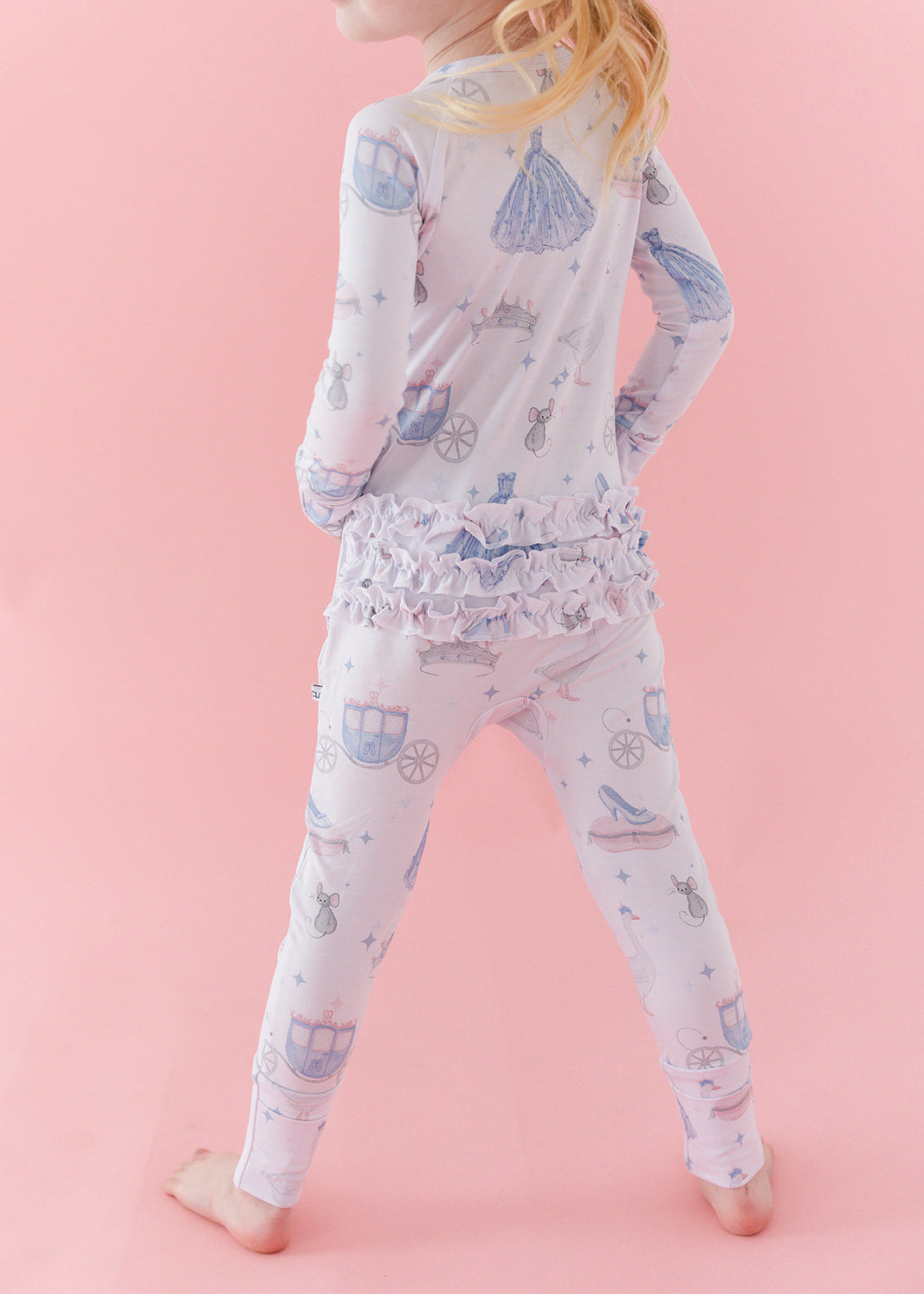 Bamboo convertible double zipper romper with hand and foot cuffs. Zippy has a vintage Disney Cinderella print on it.