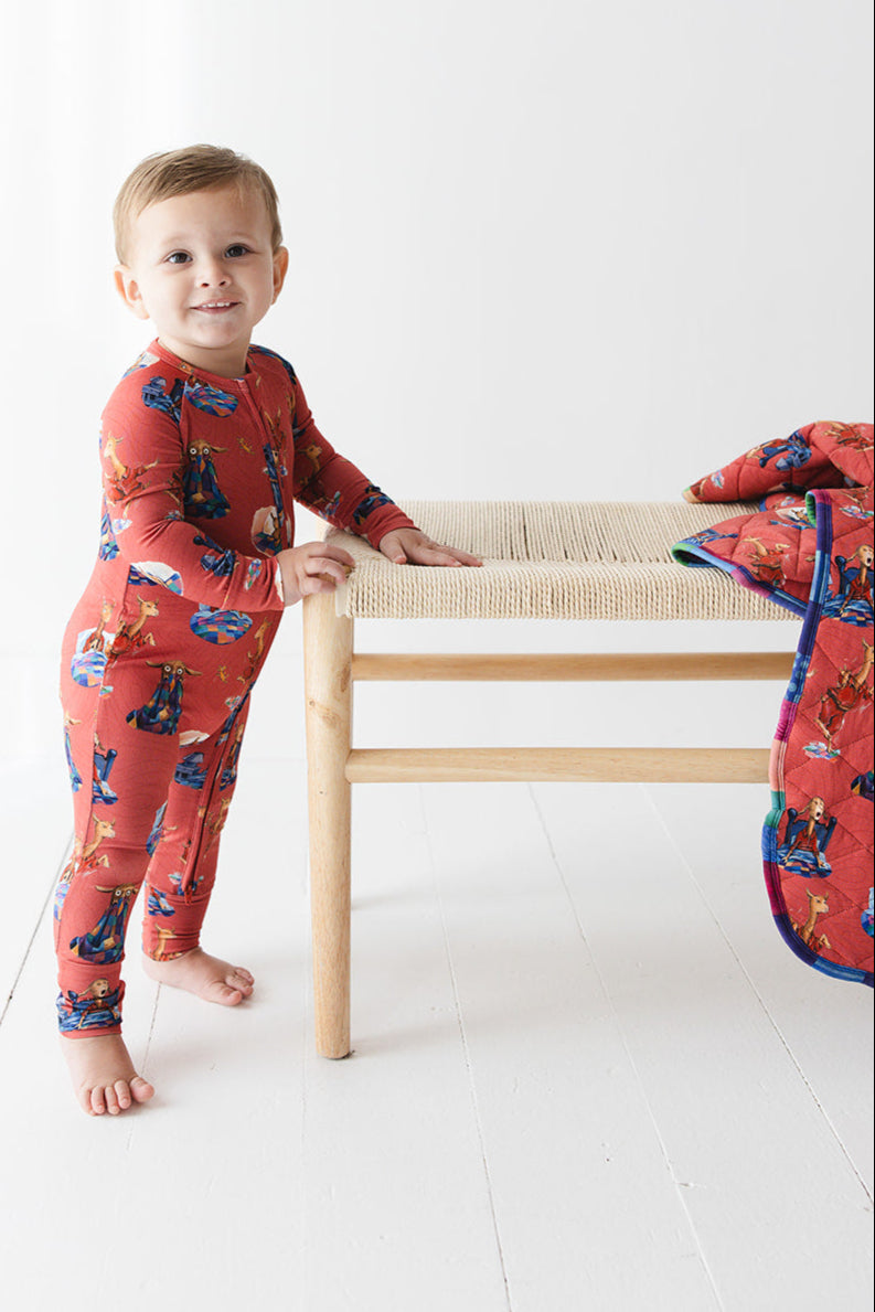 Bamboo convertible romper with hand and foot cuffs for babies and toddlers, both boys and girls. Print features a red background with Llama Llama Red Pajama.