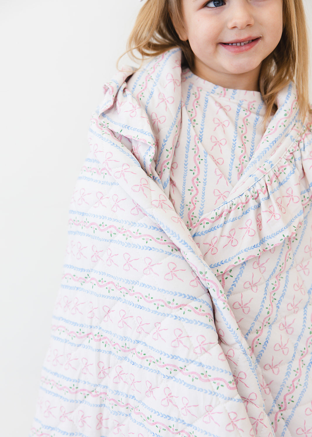 Vintage and dainty floral bow bamboo quilted blanket with 3.0 TOG filling for baby and toddler girls.