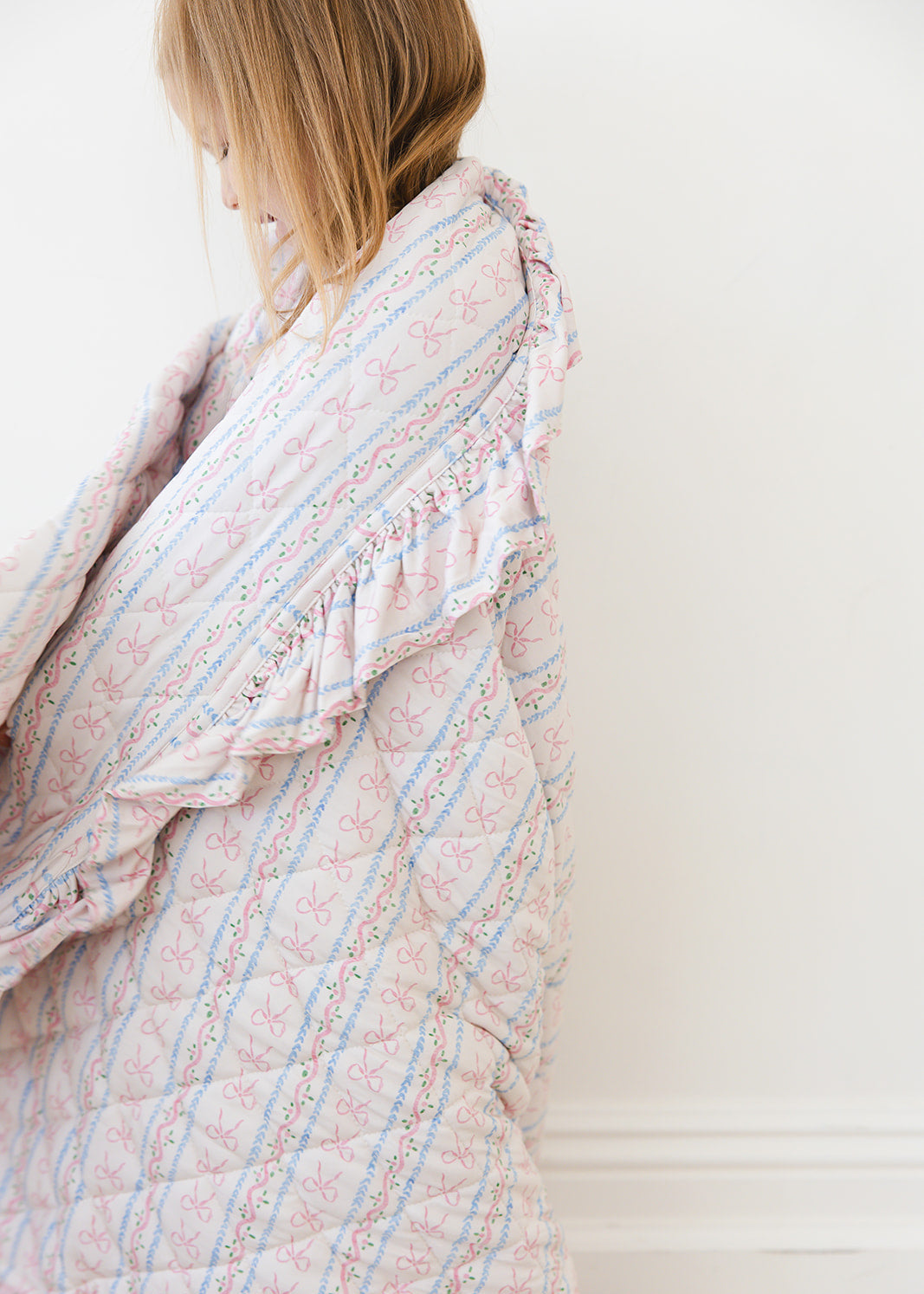 Vintage and dainty floral bow bamboo quilted blanket with 3.0 TOG filling for baby and toddler girls.