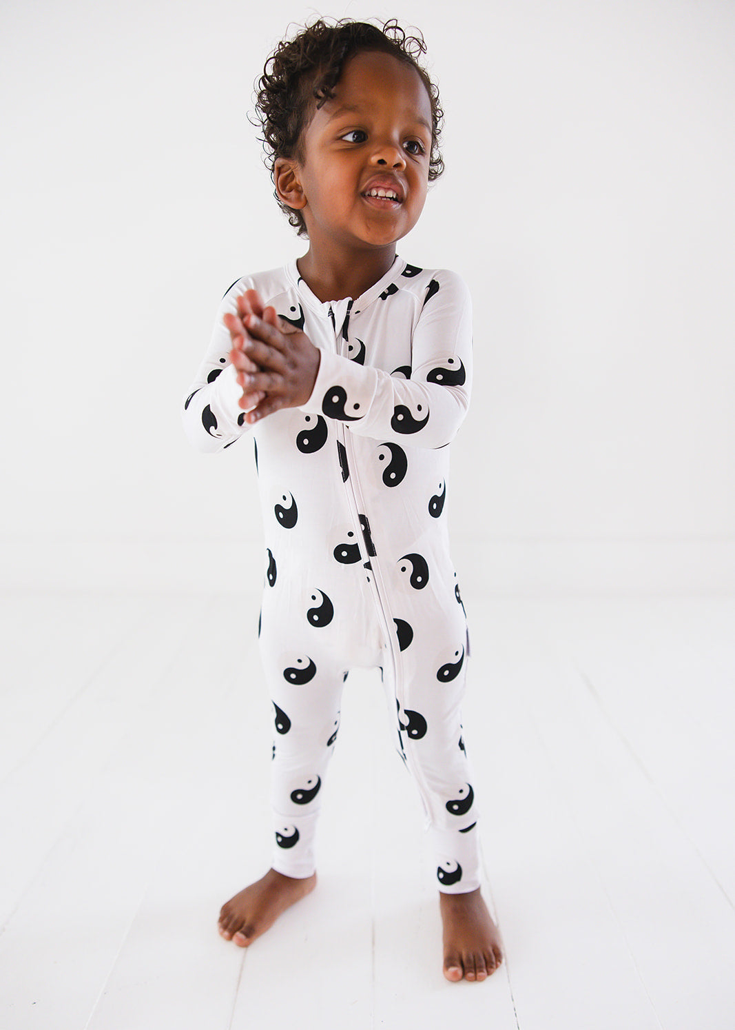 Bamboo convertible romper zippy with yin and yang print.
