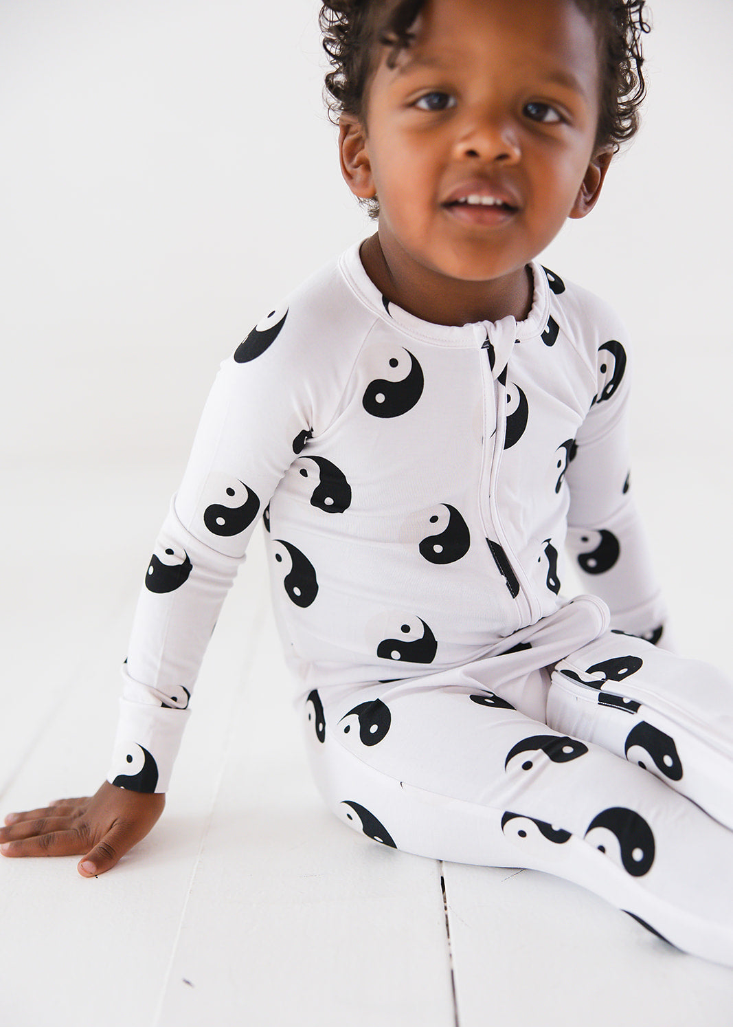 Bamboo convertible romper zippy with yin and yang print.