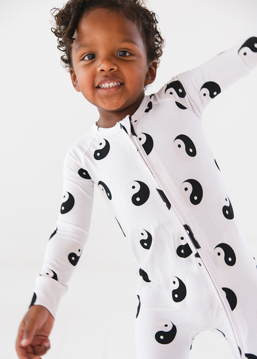 Bamboo convertible romper zippy with yin and yang print.