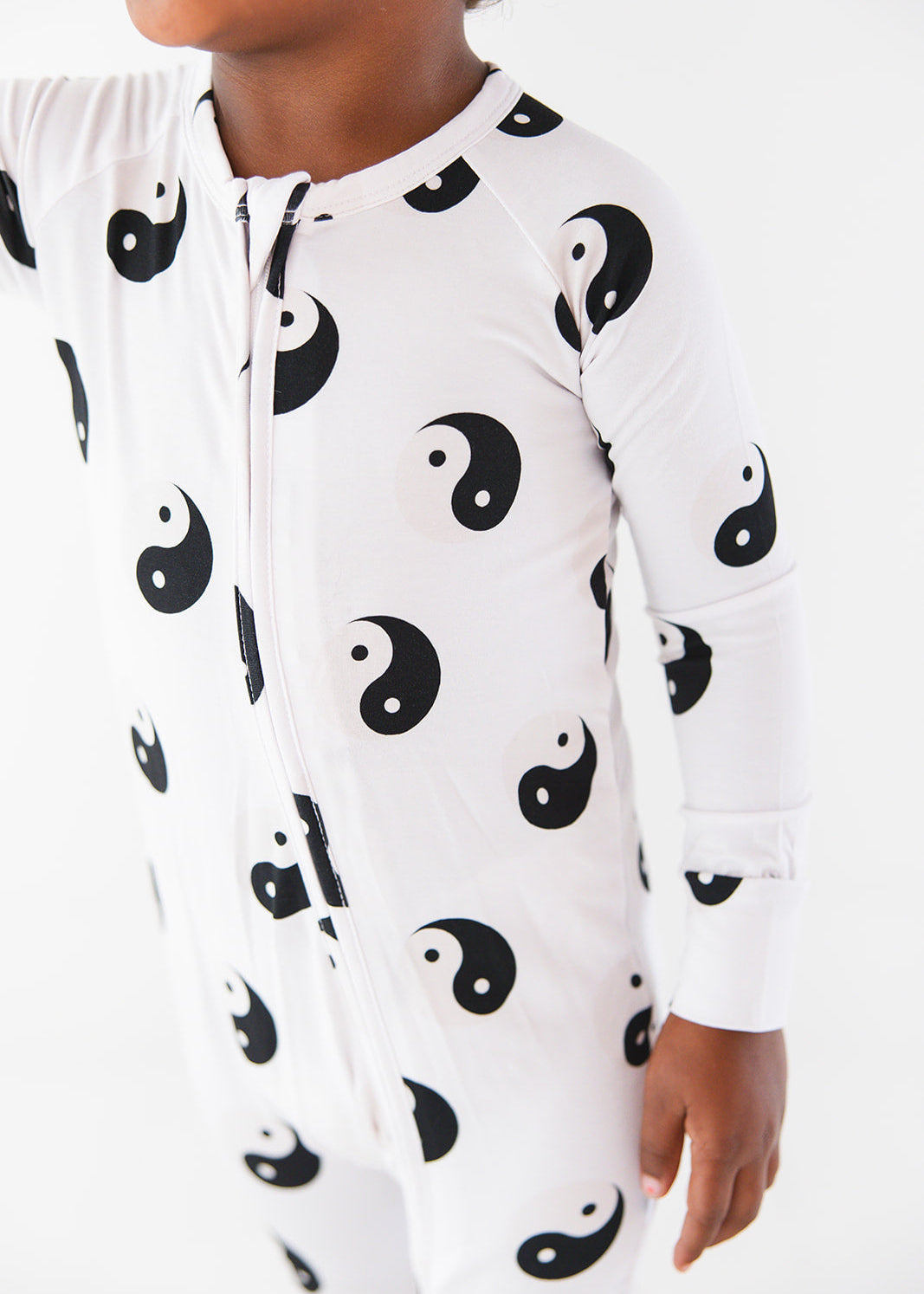 Bamboo convertible romper zippy with yin and yang print.