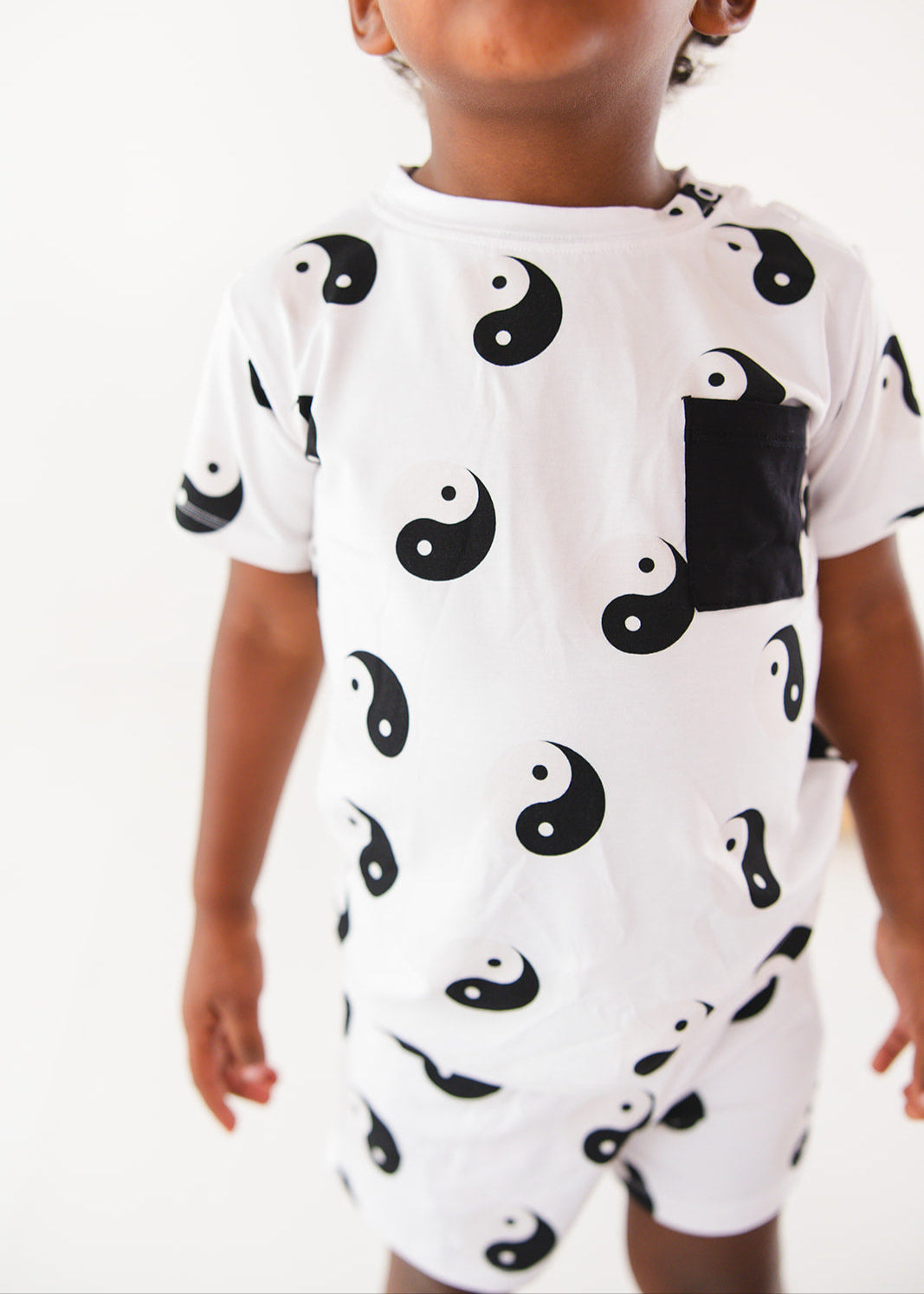 Bamboo shorts and t-shirt set with adjustable drawstring and pockets featuring a yin & yang print for baby, toddler and little boys.