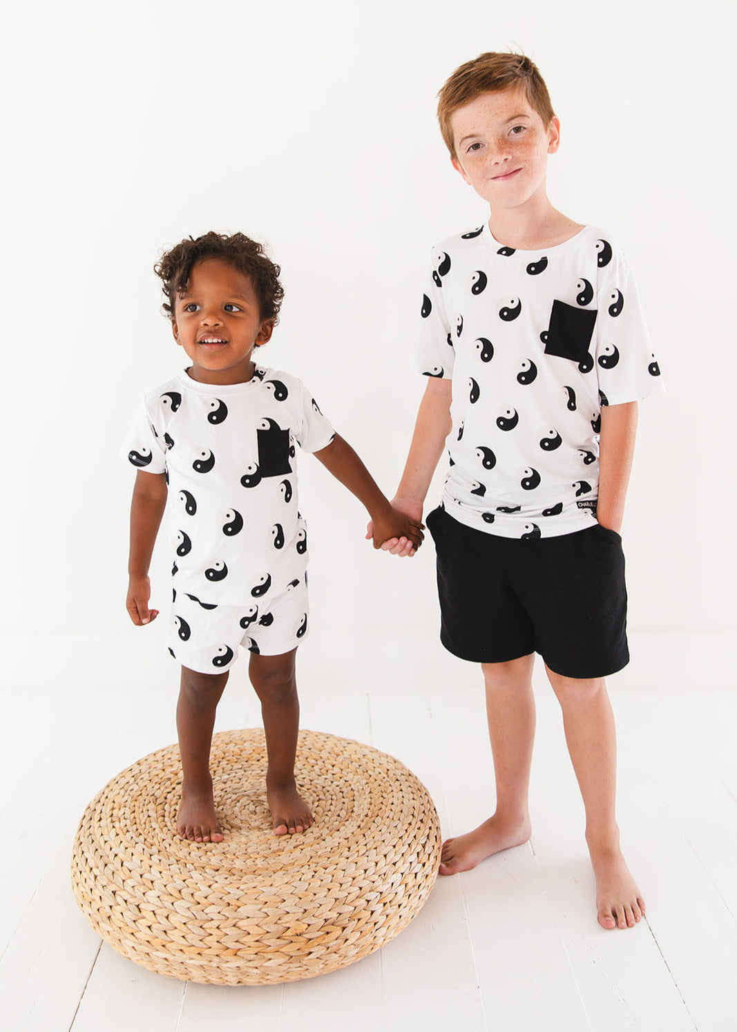 Bamboo shorts and t-shirt set with adjustable drawstring and pockets featuring a yin & yang print for baby, toddler and little boys.