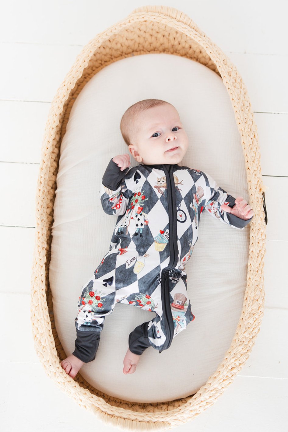 Vintage Alice in Wonderland convertible bamboo romper for baby boys and girls and gender neutral. Bamboo zippy that has UV protection, is hypoallergenic, temperature regulating and moisture wicking.
