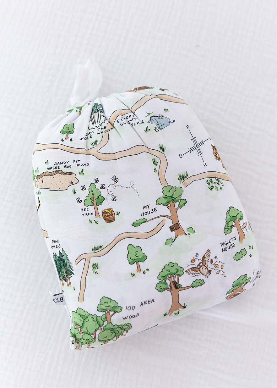 Winnie the Pooh Hundred Acre Wood bamboo crib sheet.
