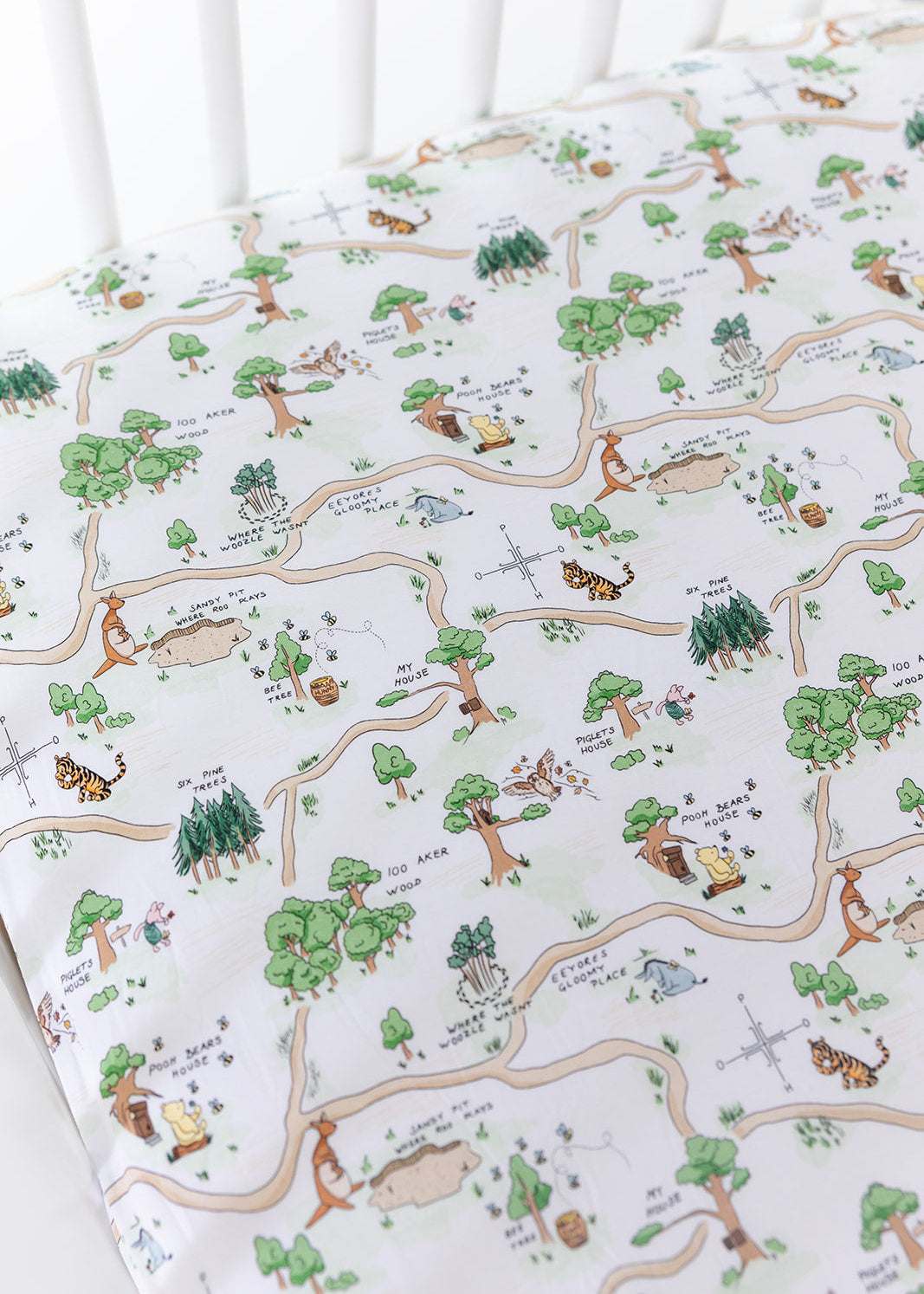 Winnie the Pooh Hundred Acre Wood bamboo crib sheet.