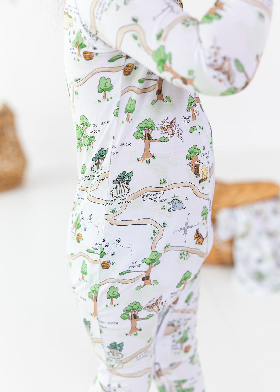 Winnie the Pooh Hundred Acre Wood convertible zippy romper.
