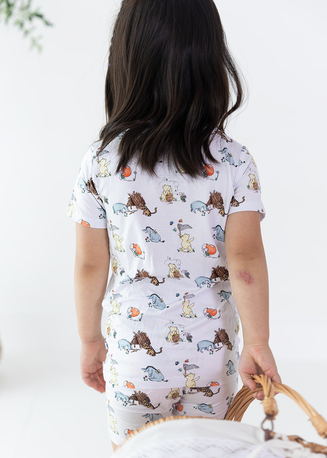 Winnie the Pooh bamboo biker shorts and shirt set for little girls.