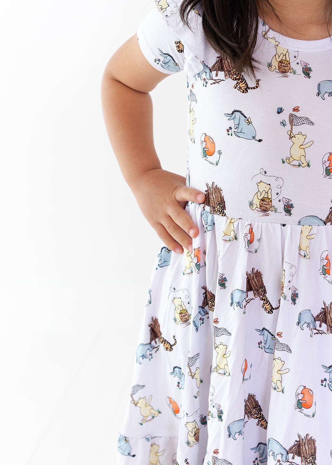 Little girl Winnie the Pooh bamboo twirl dress with matching shorts for Fall.