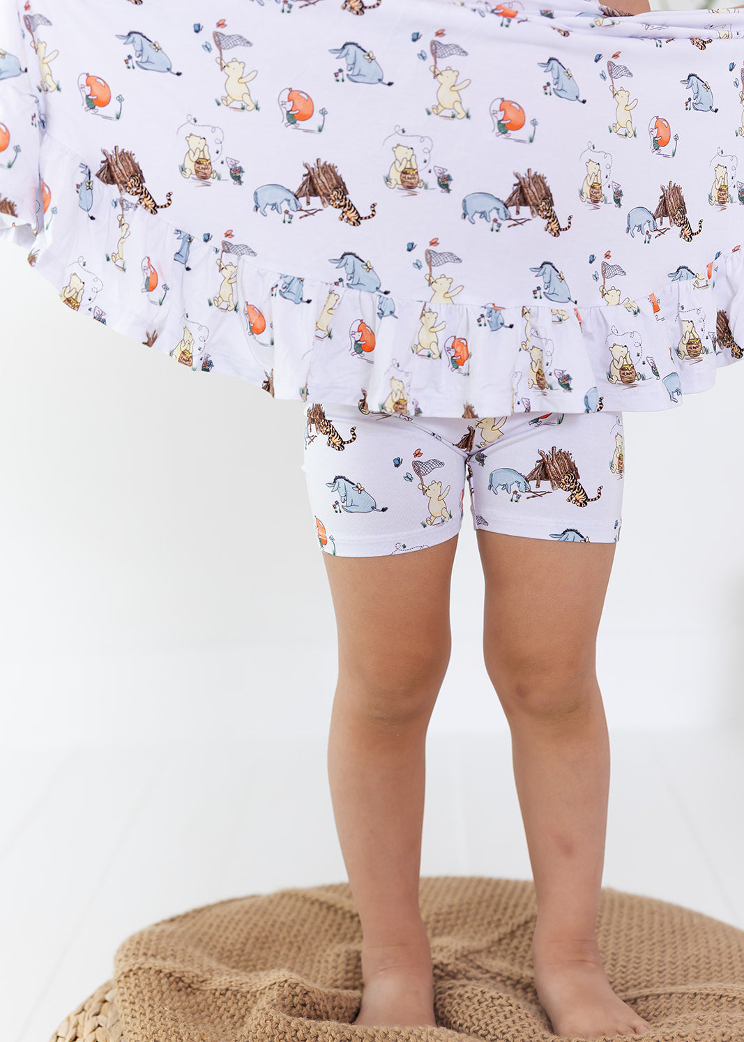 Little girl Winnie the Pooh bamboo twirl dress with matching shorts for Fall.