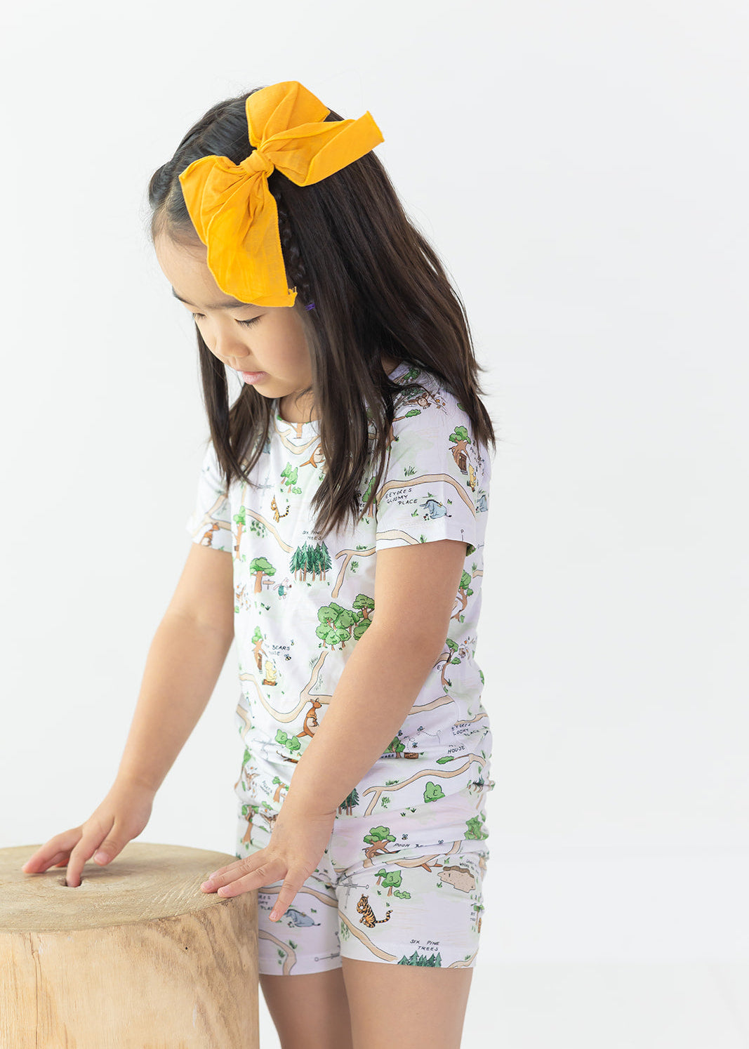 Winnie the Pooh Hundred Acre Wood bamboo biker shorts and shirt set.