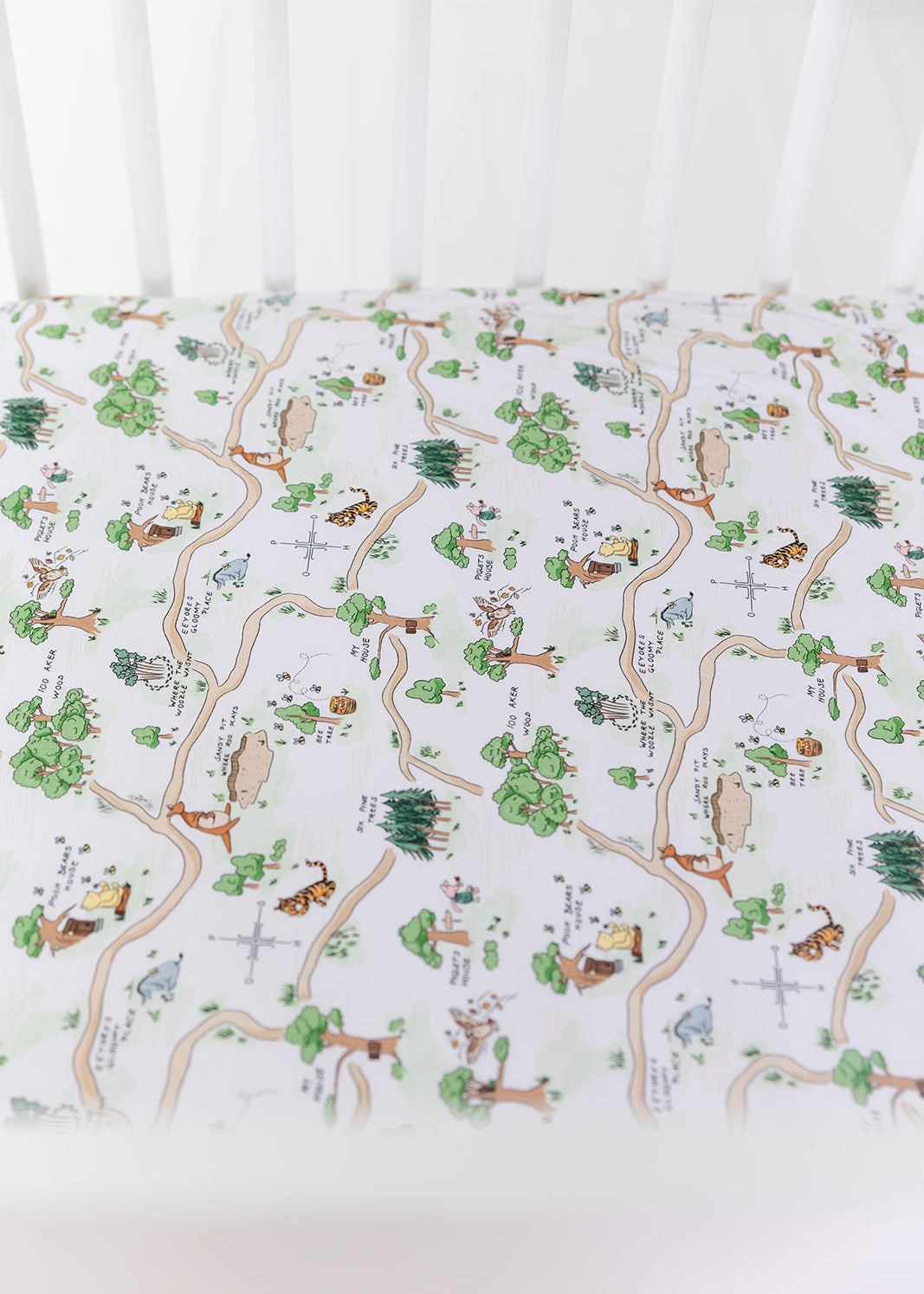 Winnie the Pooh Hundred Acre Wood bamboo crib sheet.