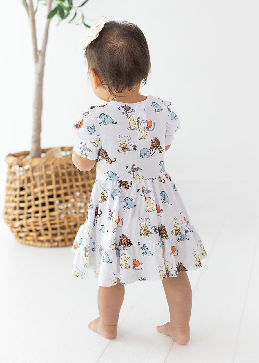 Little girl Winnie the Pooh bamboo twirl dress with matching shorts for Fall.
