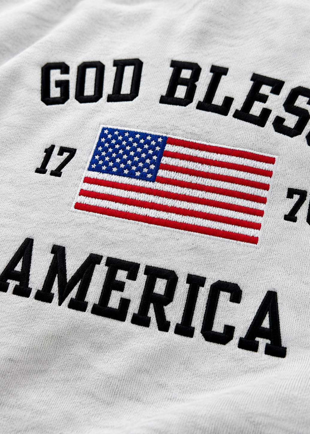 God Bless America 4th of July organic cotton embroidered t-shirt for baby, toddler, and little kids.