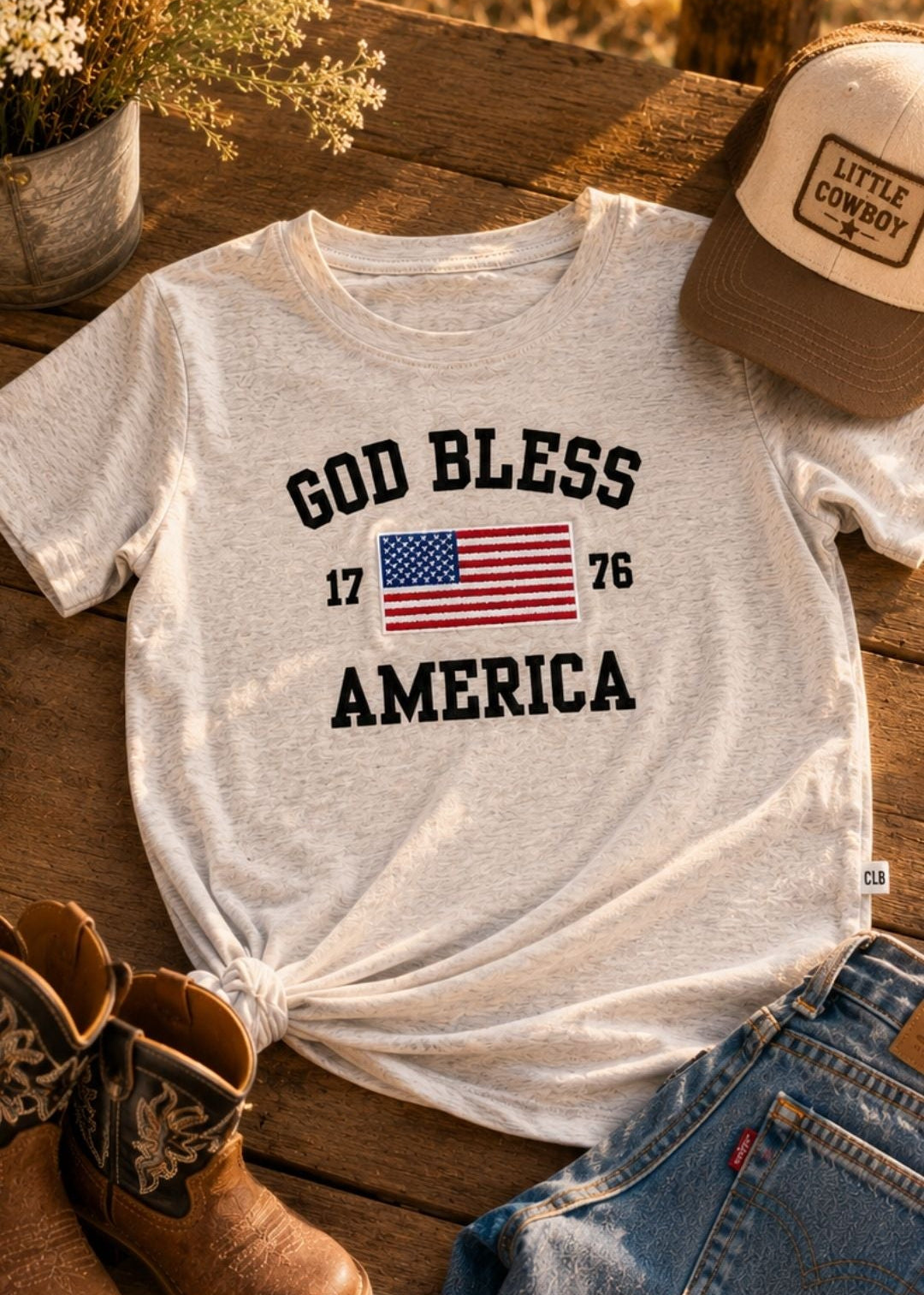 God Bless America 4th of July organic cotton embroidered t-shirt for baby, toddler, and little kids.