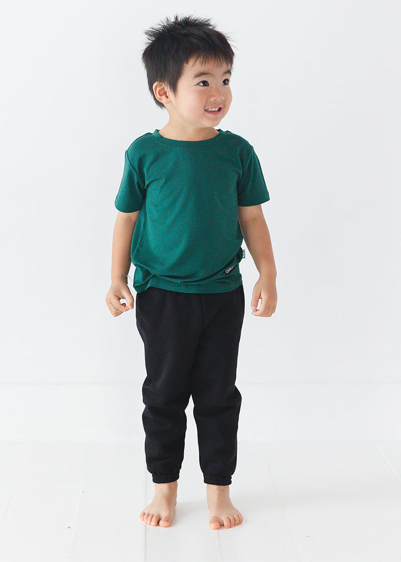 Forest green bamboo t-shirt with matching family Christmas pajamas.