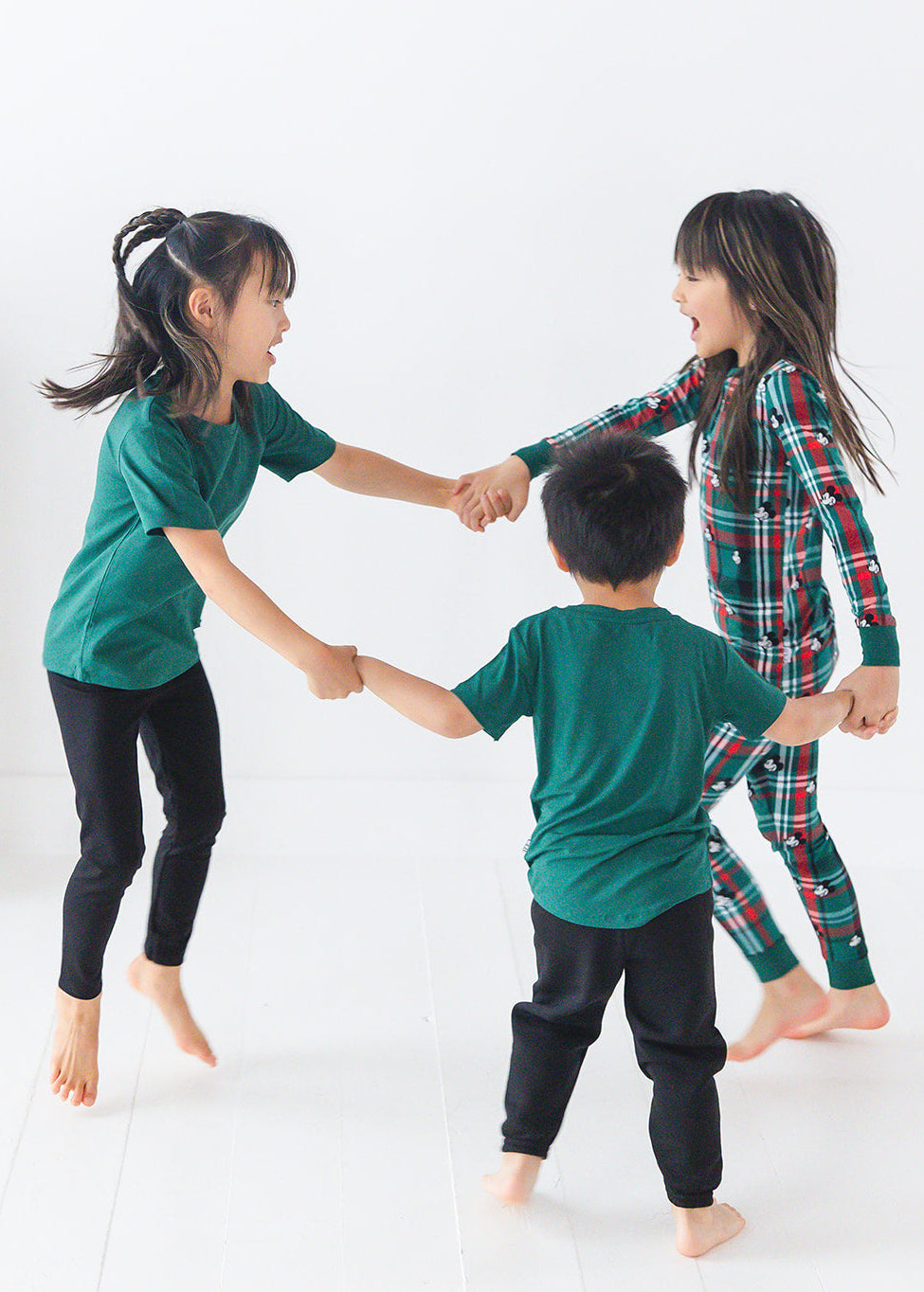 Forest green bamboo t-shirt with matching family Christmas pajamas.