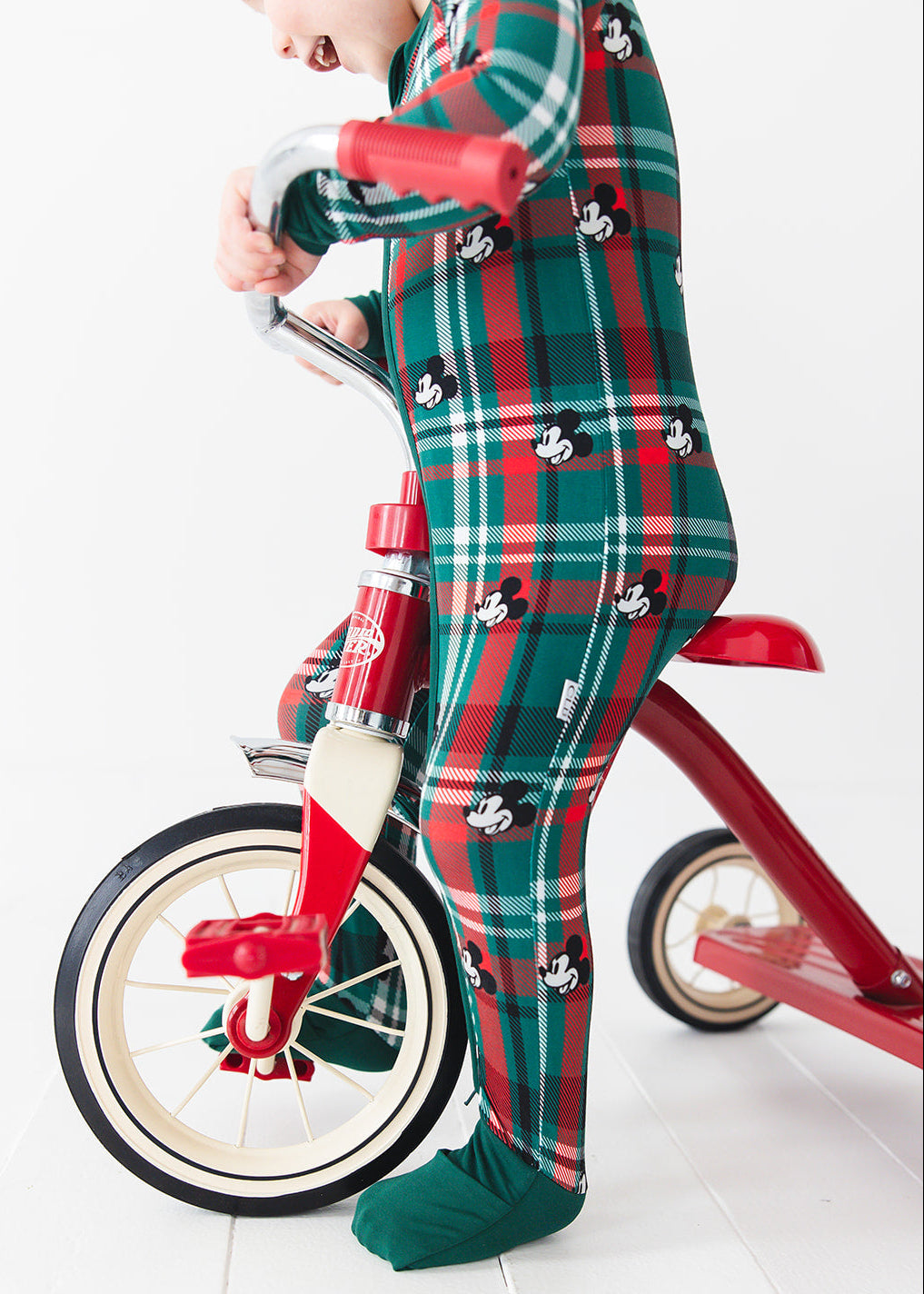 Convertible romper in zippy style with green and red tartan mickey disney print for Christmas family matching pajamas.