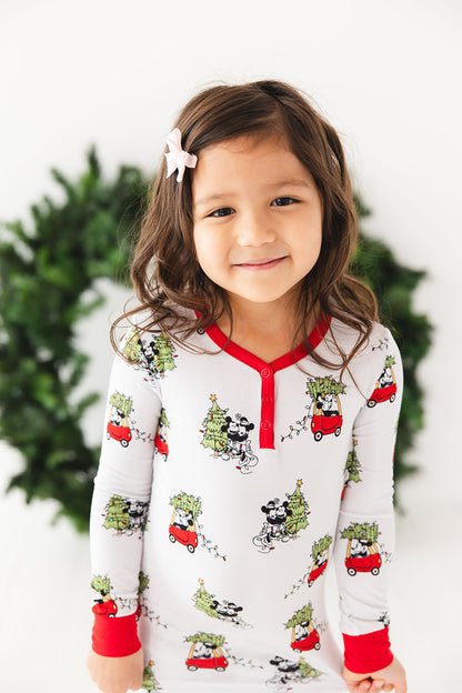 Disney Steamboat Willie bamboo pajama set, Mickey Mouse Christmas print, gender-neutral, sizes 2/3T to 8/9Y with matching family.