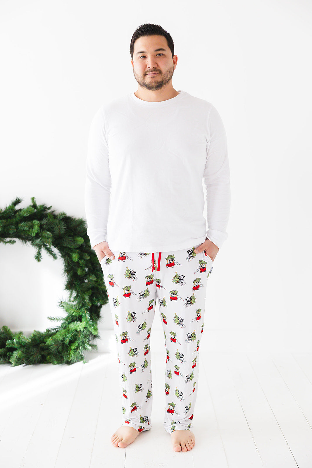 Men's bamboo pajama pants in Steamboat Willie Christmas print with a relaxed fit and functional drawstring for all-day comfort. Made from soft, breathable bamboo fabric with moisture-wicking and hypoallergenic benefits. Perfect for family matching sets.