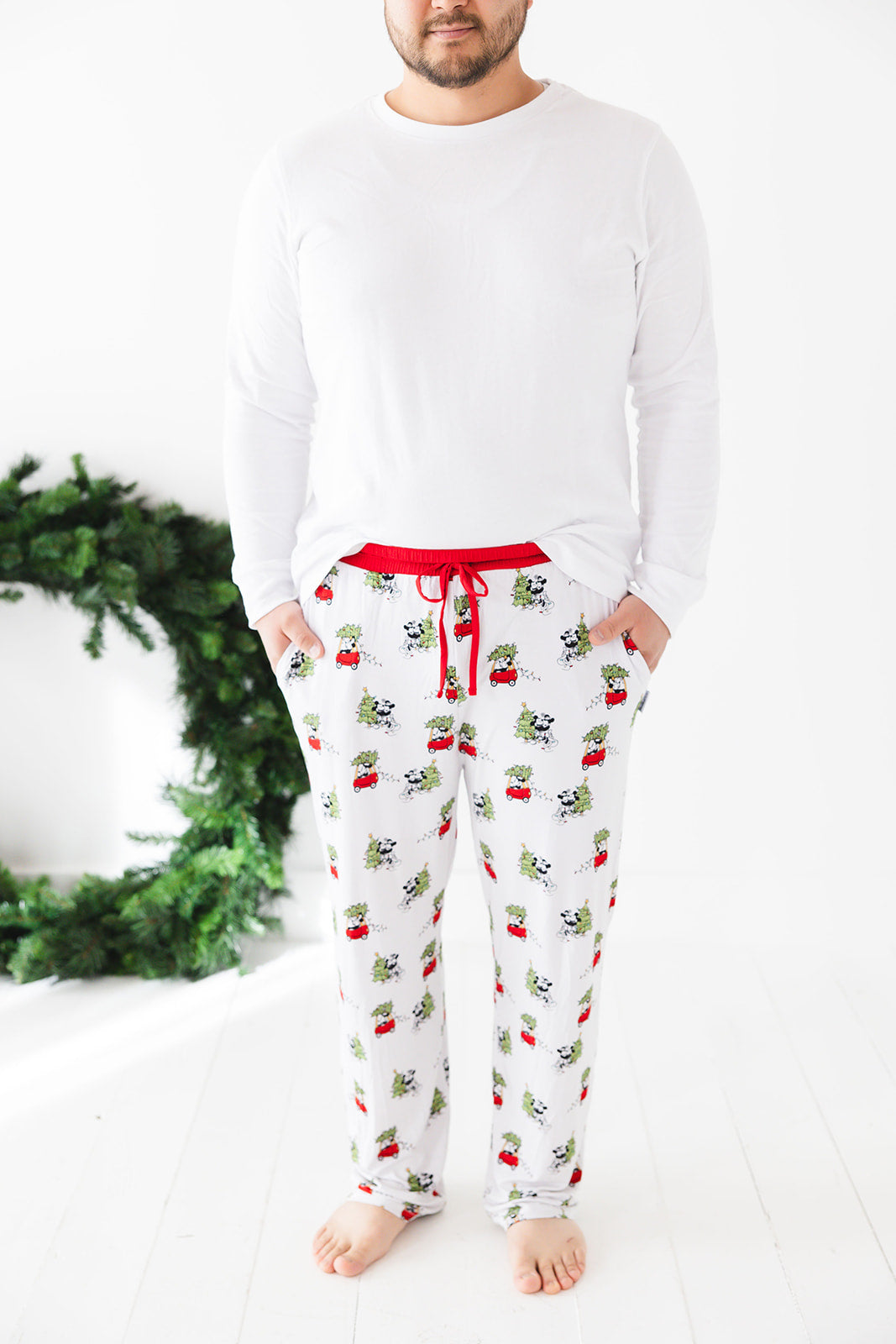 Men's bamboo pajama pants in Steamboat Willie Christmas print with a relaxed fit and functional drawstring for all-day comfort. Made from soft, breathable bamboo fabric with moisture-wicking and hypoallergenic benefits. Perfect for family matching sets.