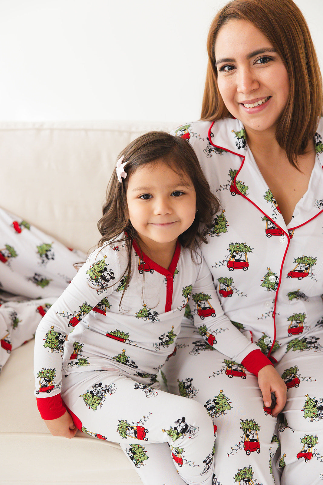 Disney Steamboat Willie bamboo pajama set, Mickey Mouse Christmas print, gender-neutral, sizes 2/3T to 8/9Y with matching family.