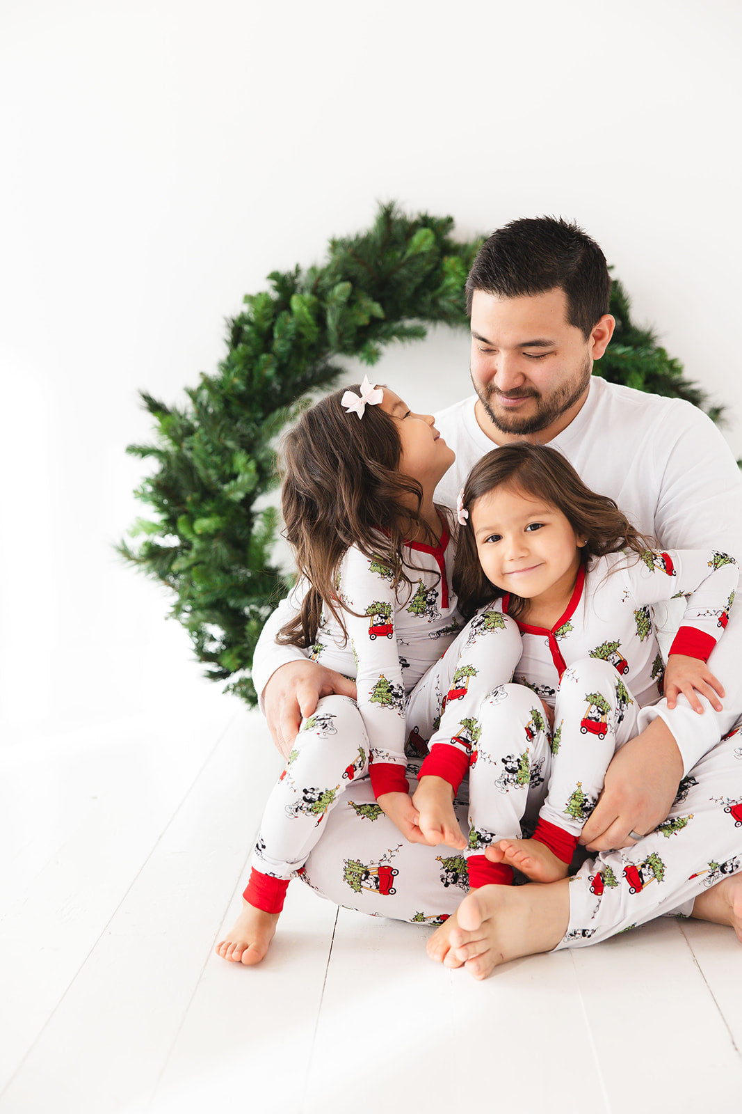 Disney Steamboat Willie bamboo pajama set, Mickey Mouse Christmas print, gender-neutral, sizes 2/3T to 8/9Y with matching family.