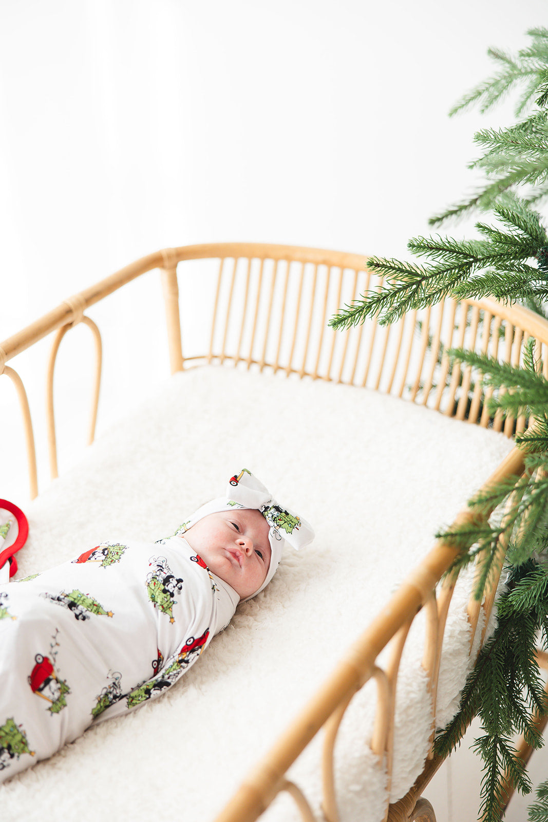 Bamboo bow & headwrap with Steamboat Willie Christmas print featuring Disney's Mickey and Minnie Mouse.