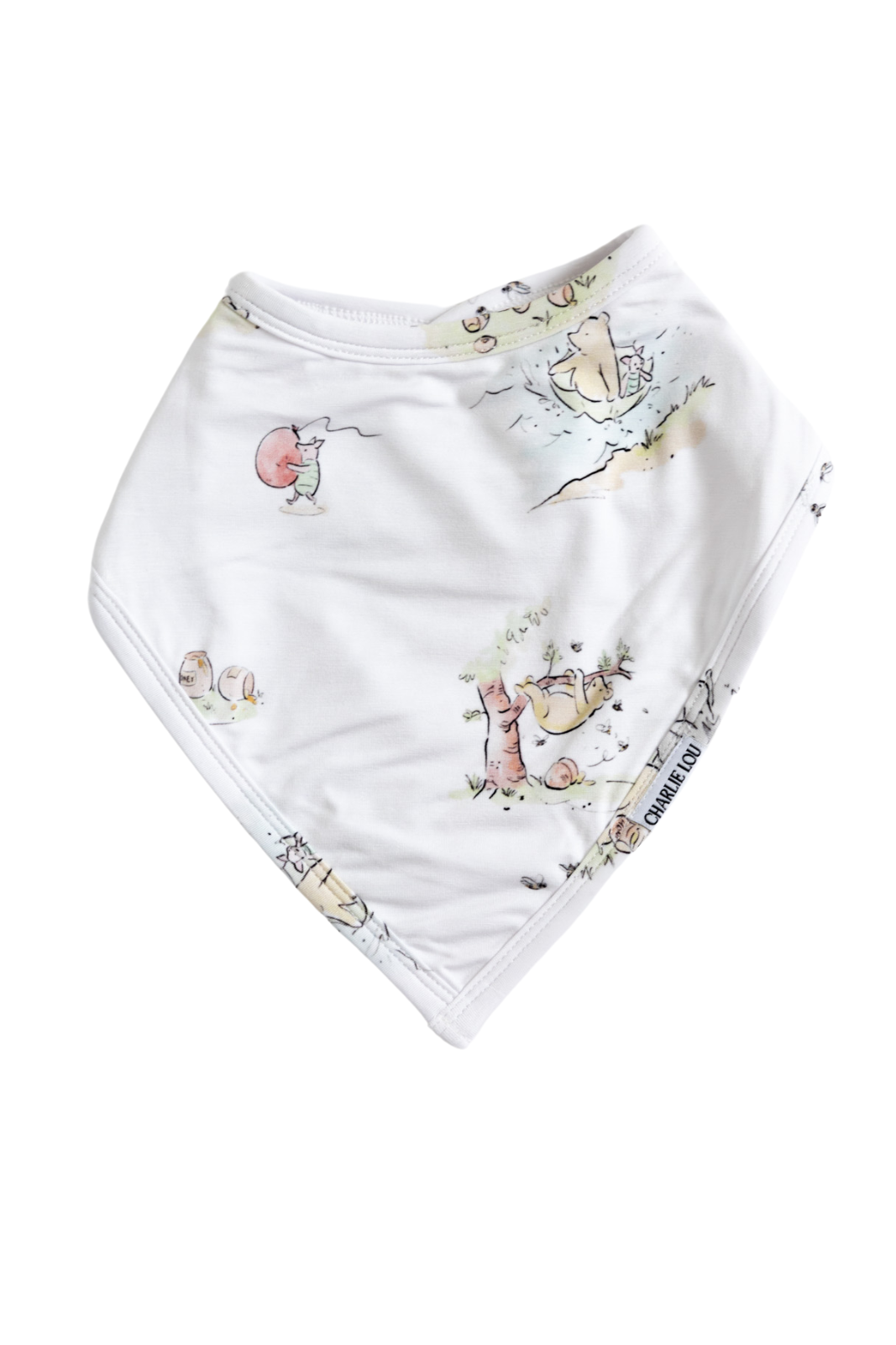 Winnie the Pooh bamboo bib with terry cloth lining and snaps on the back.