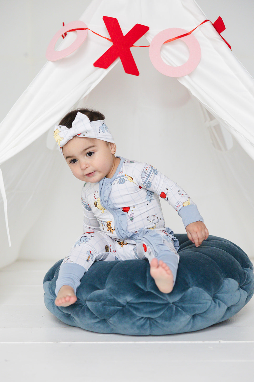 Vintage Winnie the Pooh bamboo pajama Ruffle Convertible Romper with Tigger, Eeyore and Piglet in a Valentine's Day print for baby and toddler boys and girls. Perfect for sibling matching and gender neutral.