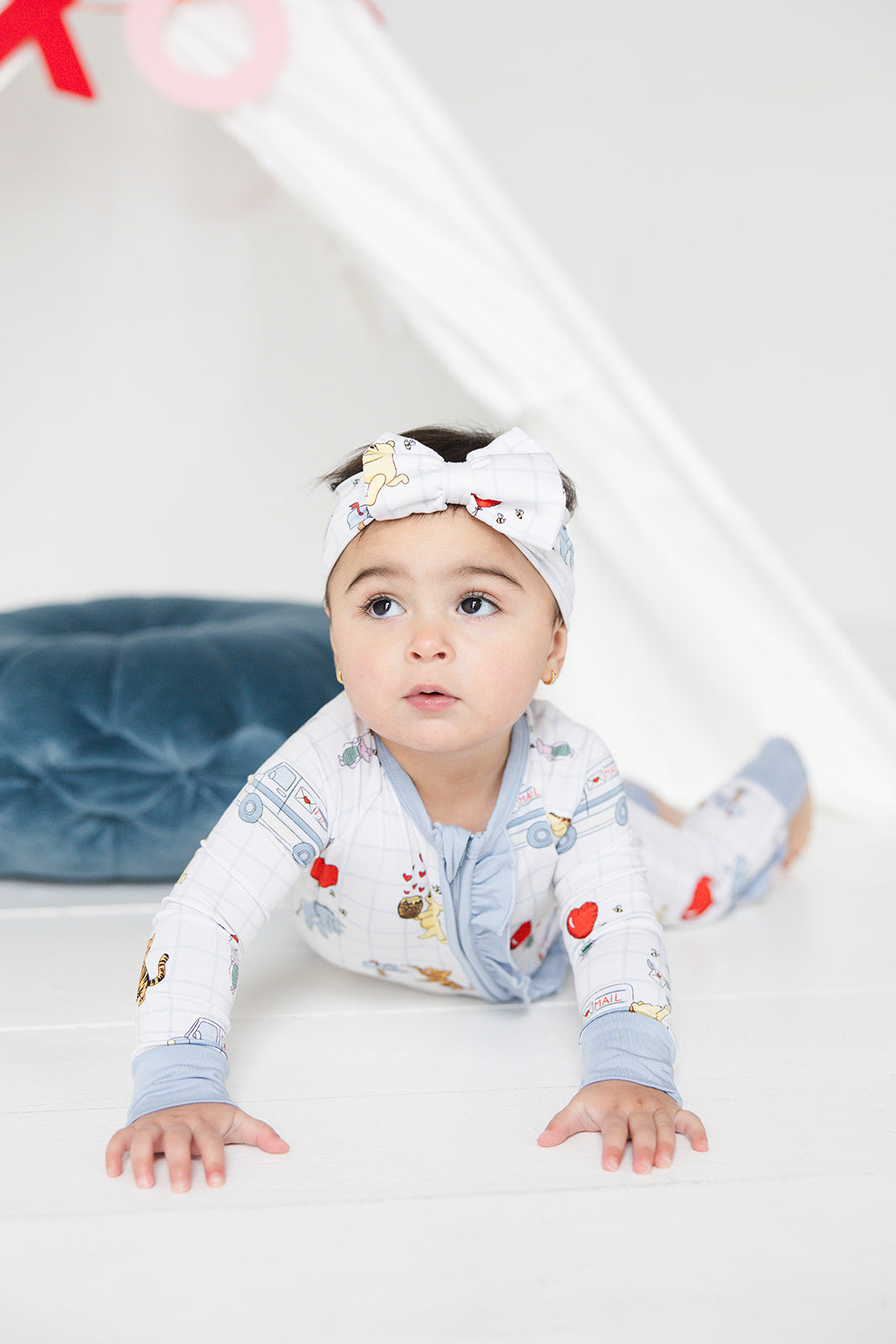 Vintage Winnie the Pooh bamboo pajama Ruffle Convertible Romper with Tigger, Eeyore and Piglet in a Valentine's Day print for baby and toddler boys and girls. Perfect for sibling matching and gender neutral.