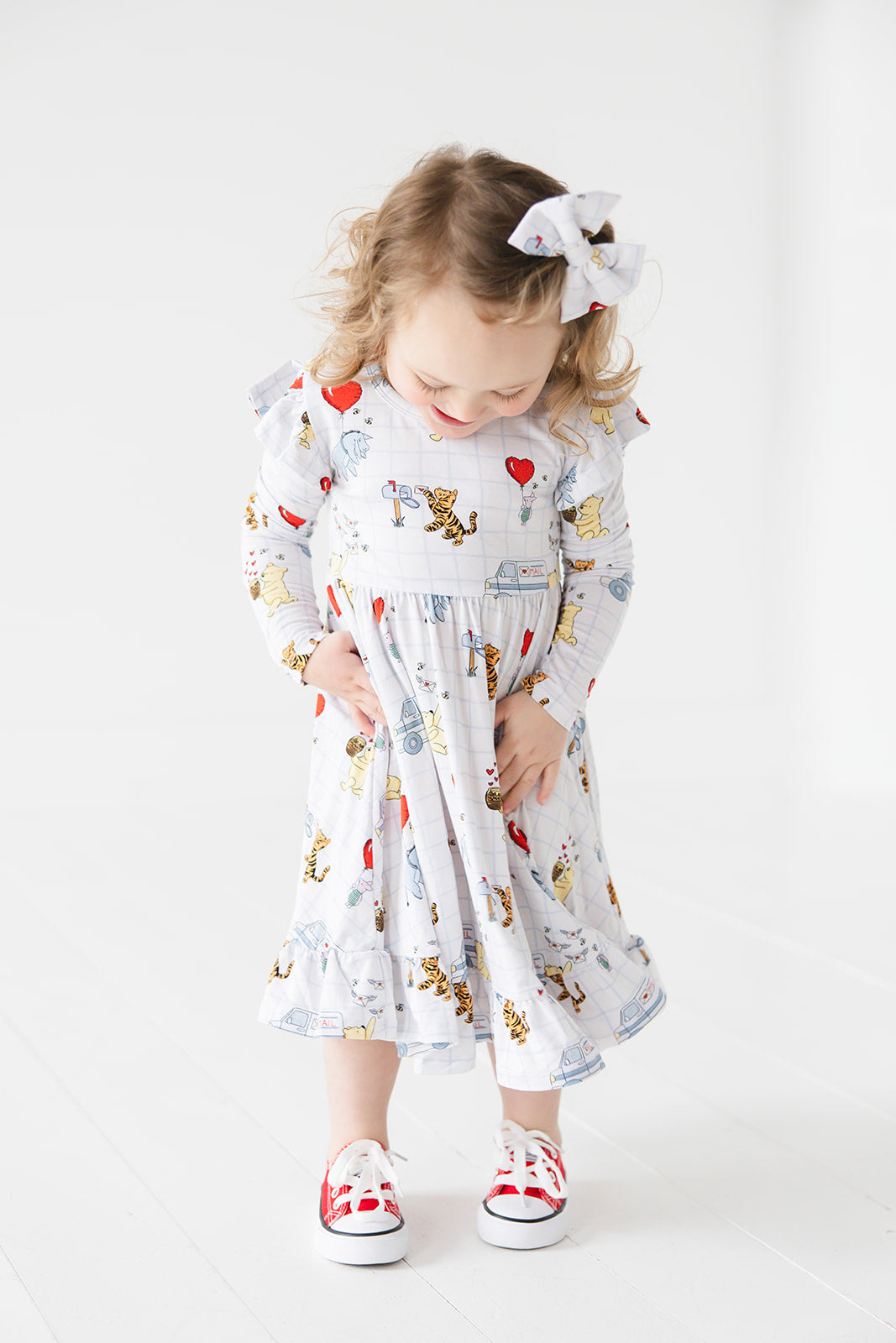 Vintage Winnie the Pooh bamboo alligator clip bow with Tigger, Eeyore and Piglet in a Valentine's Day print for baby and toddler boys and girls. Perfect for sibling matching and gender neutral.