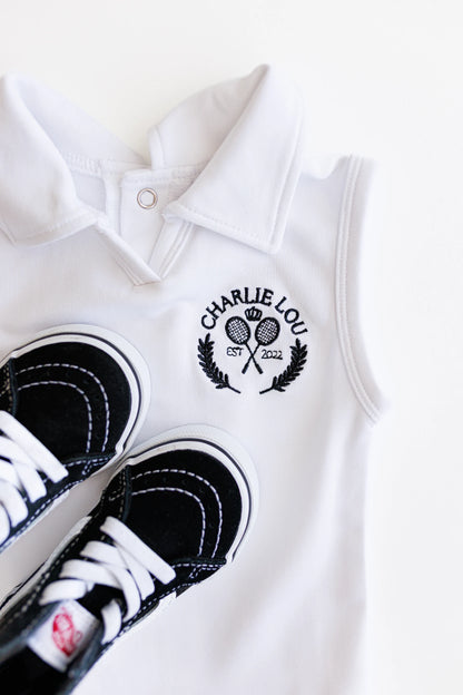 Baby girls and toddler girls white tennis dress made from bamboo with bodysuit underneath.