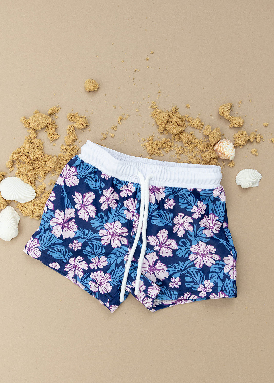 Floral boy's swim shorts with adjustable waistband. Baby, toddler and little boy swim trunks. Matching sibling swim.