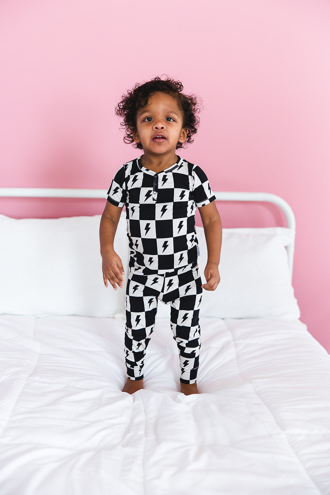 Checkered lightning bamboo two piece pajama set for babies and toddlers, both boys and girls.