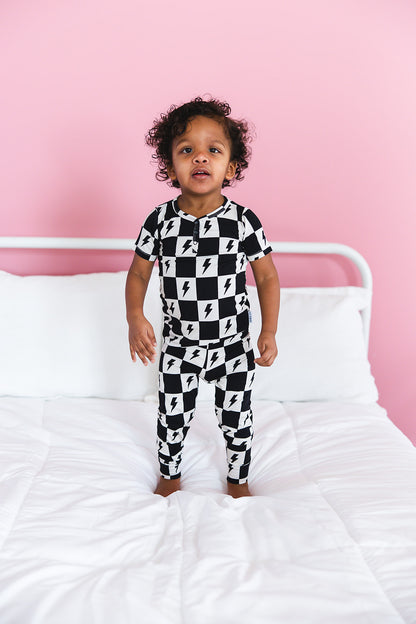 Checkered lightning bamboo two piece pajama set for babies and toddlers, both boys and girls.