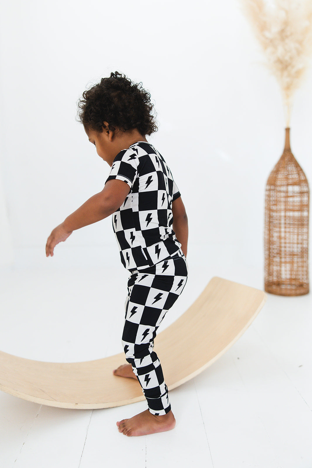 Checkered lightning bamboo two piece pajama set for babies and toddlers, both boys and girls.