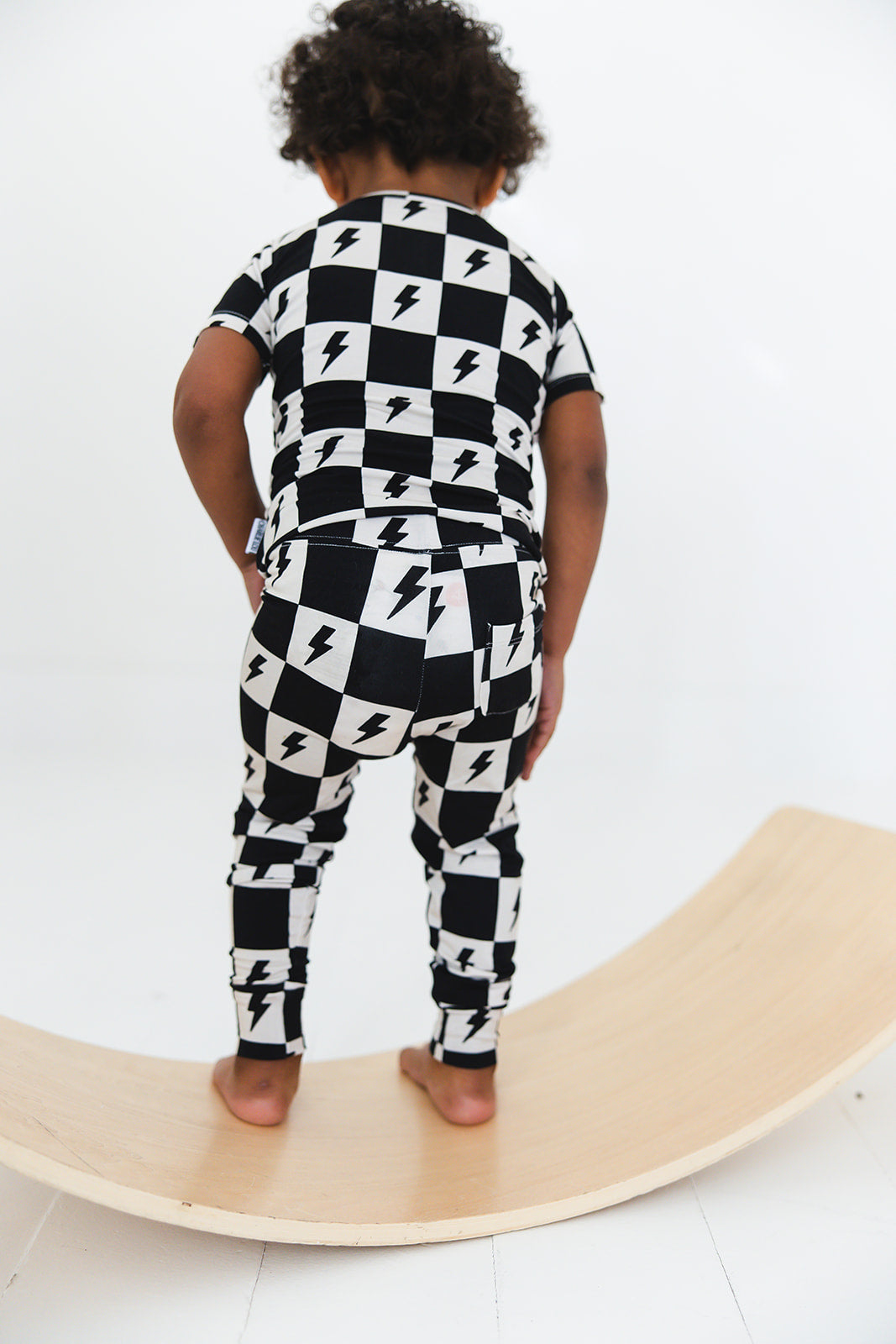 Checkered lightning bamboo two piece pajama set for babies and toddlers, both boys and girls.