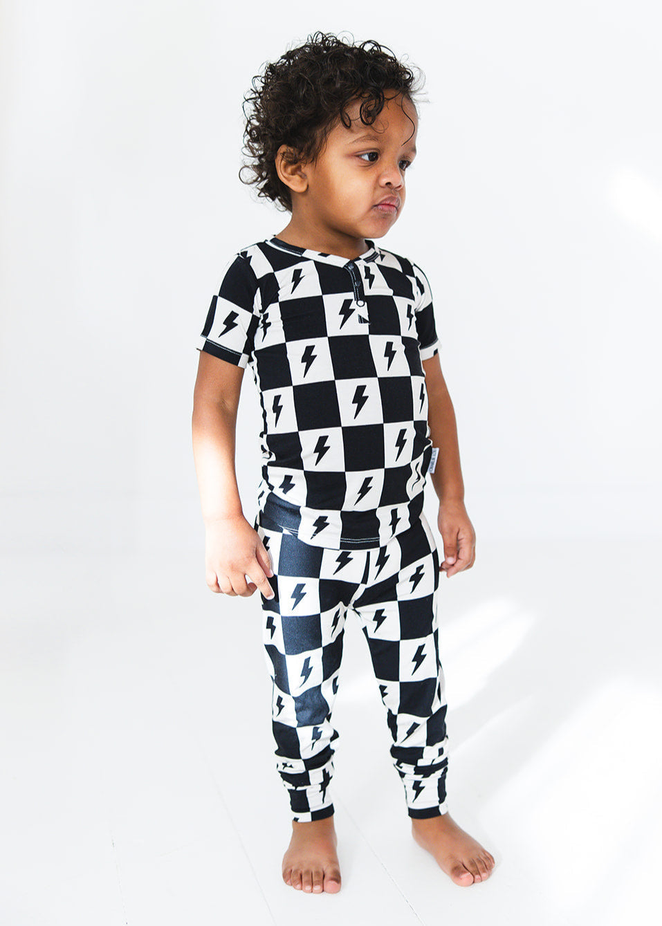 Checkered lightning bamboo two piece pajama set for babies and toddlers, both boys and girls.