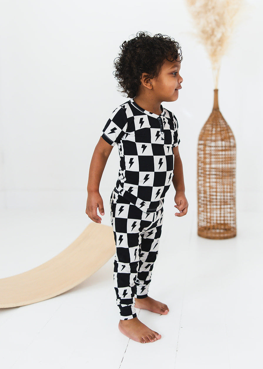 Checkered lightning bamboo two piece pajama set for babies and toddlers, both boys and girls.