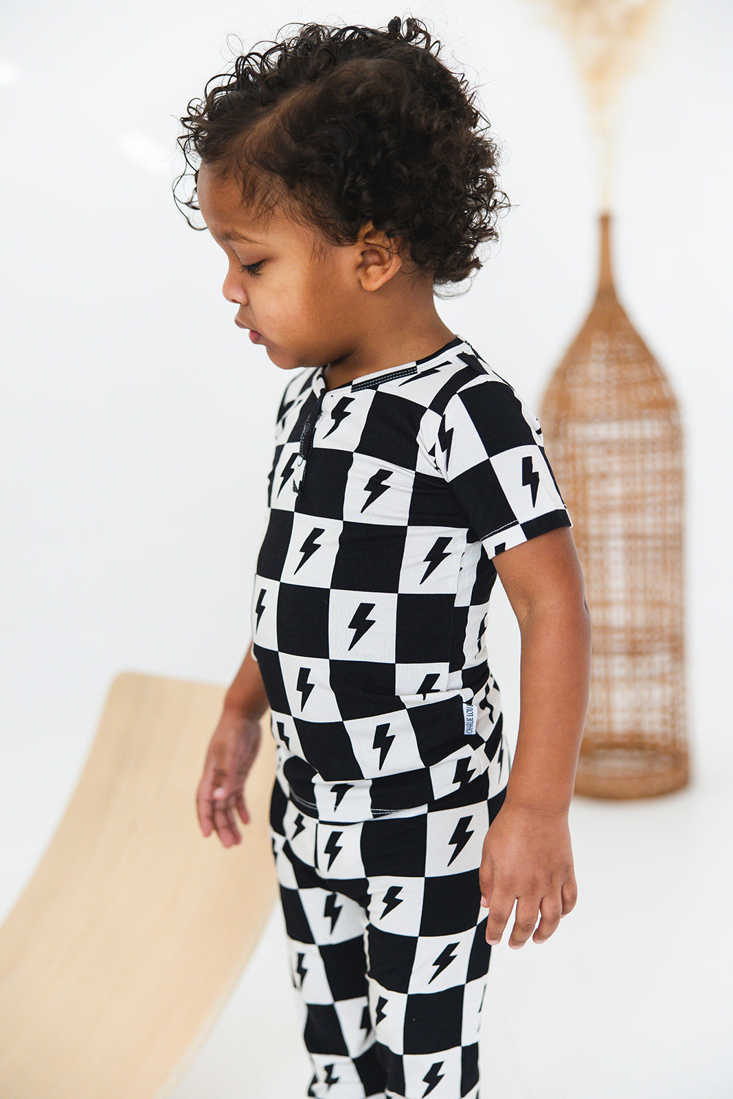 Checkered lightning bamboo two piece pajama set for babies and toddlers, both boys and girls.